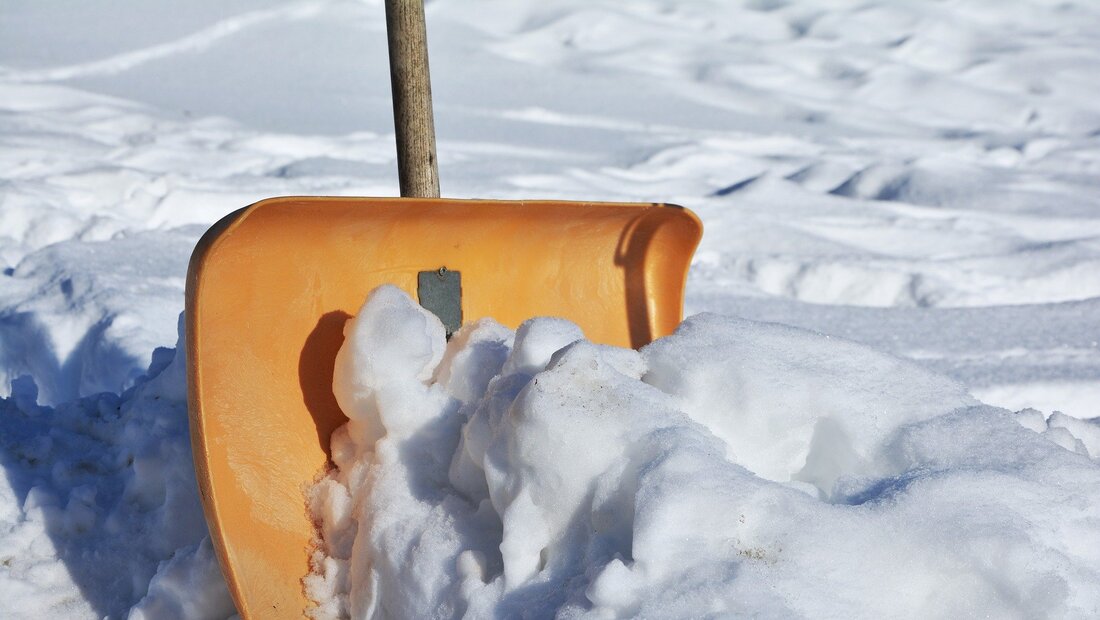 Shovel snow in Michigan winter